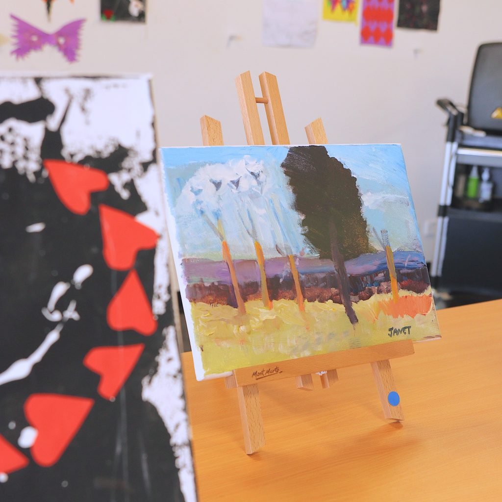 A small painting on a mini easel